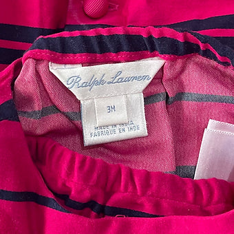 Close-up of Ralph Lauren baby pink velvet dress