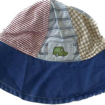 Back view of the Blue Racoon Baby Boys Quilted Hat showing full patchwork design.