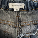 Back pocket detail of boys denim jeans size 4