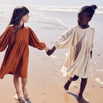 A dreamy, neutral-toned cotton dress for girls, designed with a relaxed fit and elegant draped sleeves for timeless charm and comfort | Dream Nu
