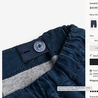Close-up of soft corduroy fabric and stitching details on H&M pants.