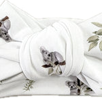 Organic baby headband displayed as a perfect baby shower gift