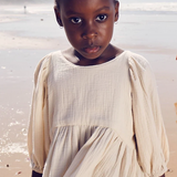 The Gaia Cotton Girls Dress in Sand – a breathable, oversized cotton dress with elegant puffed sleeves, perfect for stylish and comfortable wear | Dream Nu