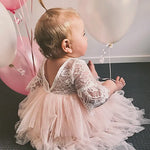 Back view showing V-back of white pink tutu dress