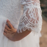 Side angle showcasing flowy tutu and lace detail