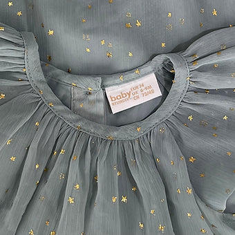 Full outfit layout of Lindex baby girls grey sparkle dress