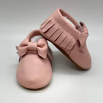 Soft sole leather baby moccasins with fringe in neutral tones
