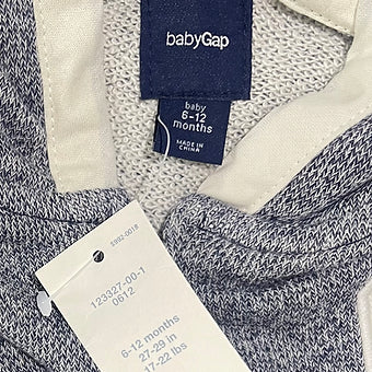 Fabric close-up of newborn grey zip hoodie jacket - Baby Gap