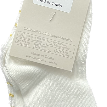 Soft cotton newborn socks in gold and cream from Marquise