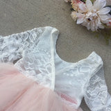 Toddler in tutu dress at outdoor event