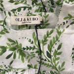 Tropicana Floral Romper Dress – Baby girl’s breathable cotton romper with ruffle sleeves and a hand-painted floral design