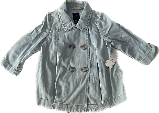 Front view of baby girl layered denim jacket in blue.